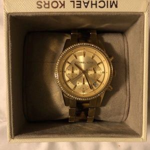 Michael Kor’s tortoise shell watch